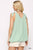 Solid Textured And Sleeveless Surplice Top With Shoulder Tie