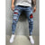 European and American high-quality ripped beggar pad fabric stretch fashion slim denim men's pants