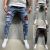 European and American high-quality ripped beggar pad fabric stretch fashion slim denim men's pants