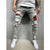 European and American high-quality ripped beggar pad fabric stretch fashion slim denim men's pants