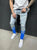 Men Ripped Jeans Slim Fit Trousers Fashion Flame Print Distressed Fringe Pencil Jeans Homme Casual Drawstring Skinny Denim Pants