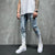 Men Ripped Jeans Slim Fit Trousers Fashion Flame Print Distressed Fringe Pencil Jeans Homme Casual Drawstring Skinny Denim Pants